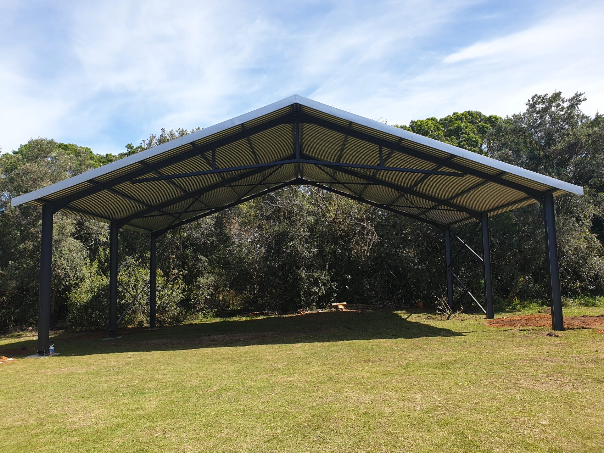 Steel structure designed, fabricated and erected. IBR roofing installed